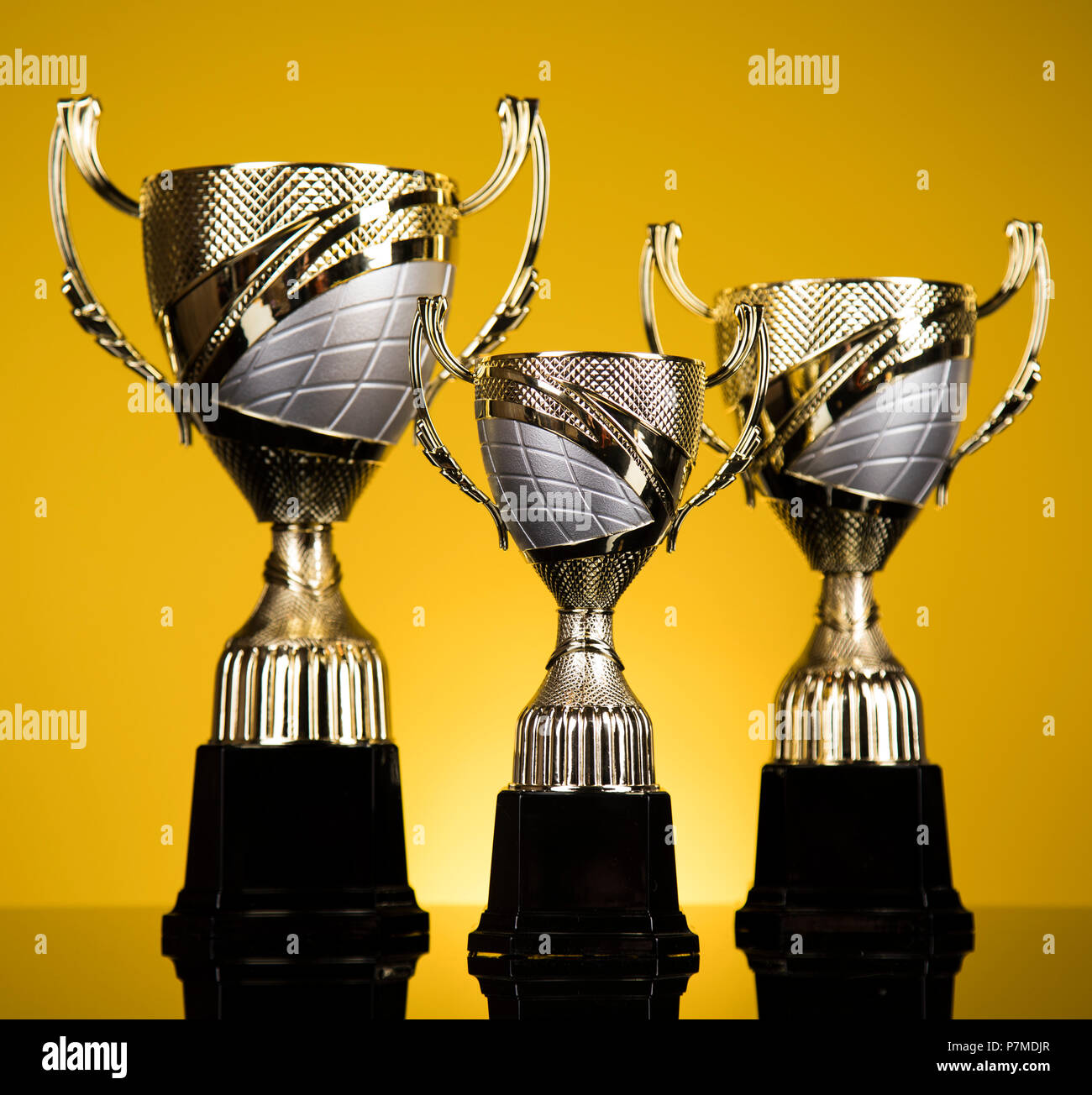 Award winning and championship concept, trophy cup on sport background