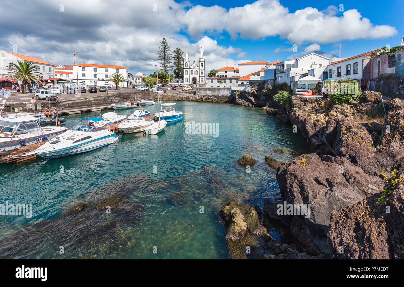 Portugal, Azores, Pico Island, Madalena, harbor view with the Igreja de Santa Madalena church Stock Photo