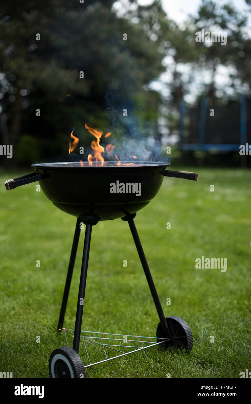 Grill on the garden, barbecue and fire background Stock Photo - Alamy