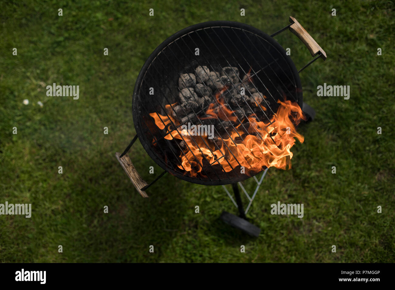 Barbecue grill with fire on nature, outdoor, close up Stock Photo Alamy