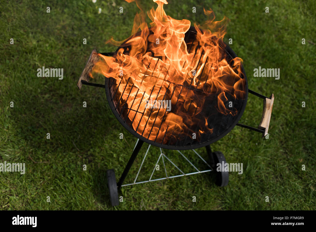 Grill on the garden, barbecue and fire background Stock Photo - Alamy