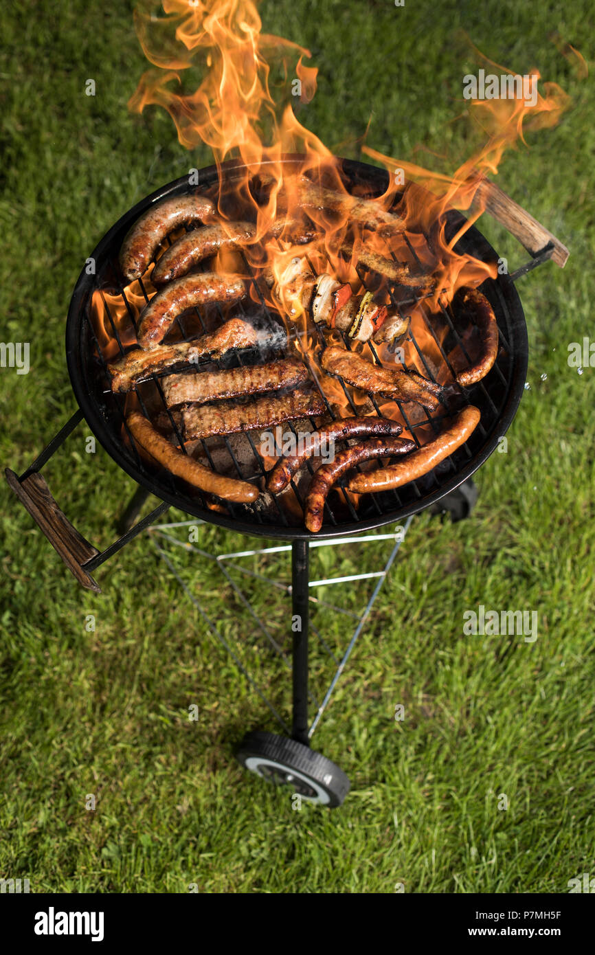 Grill with red hot briquettes, fire background Stock Photo Alamy