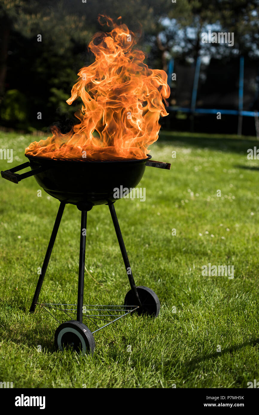 Grill on the garden, barbecue and fire background Stock Photo - Alamy