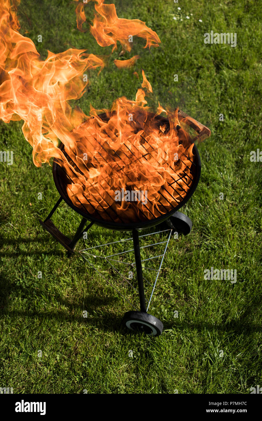 Grill on the garden, barbecue and fire background Stock Photo - Alamy