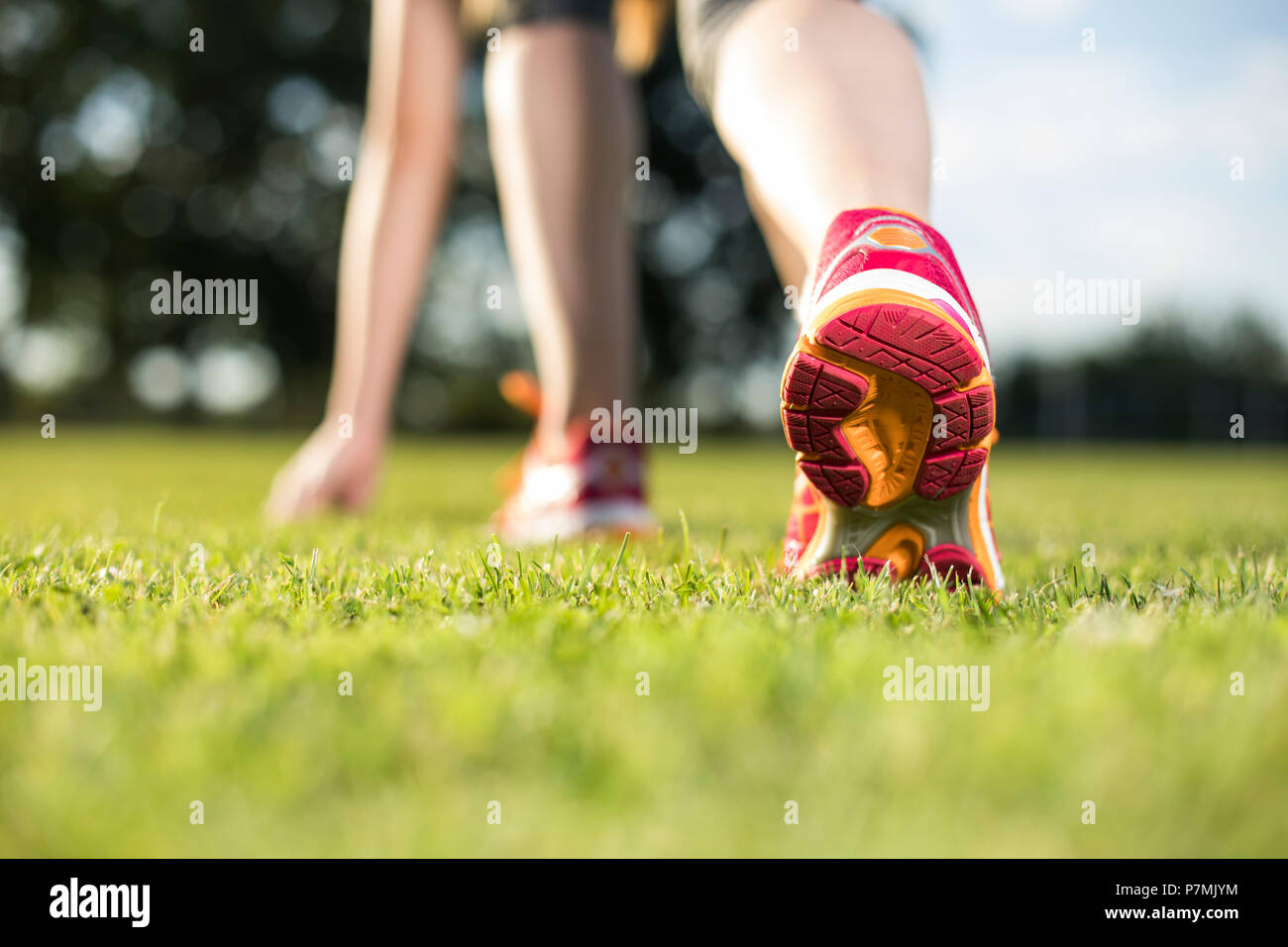 Runner feet running on road closeup on shoe Stock Photo Alamy