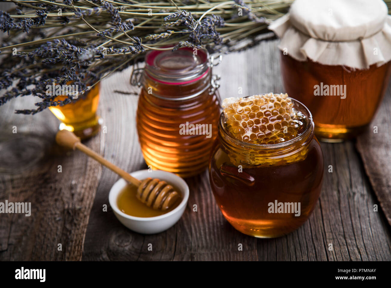 Jar of honey with Stock Photo Alamy