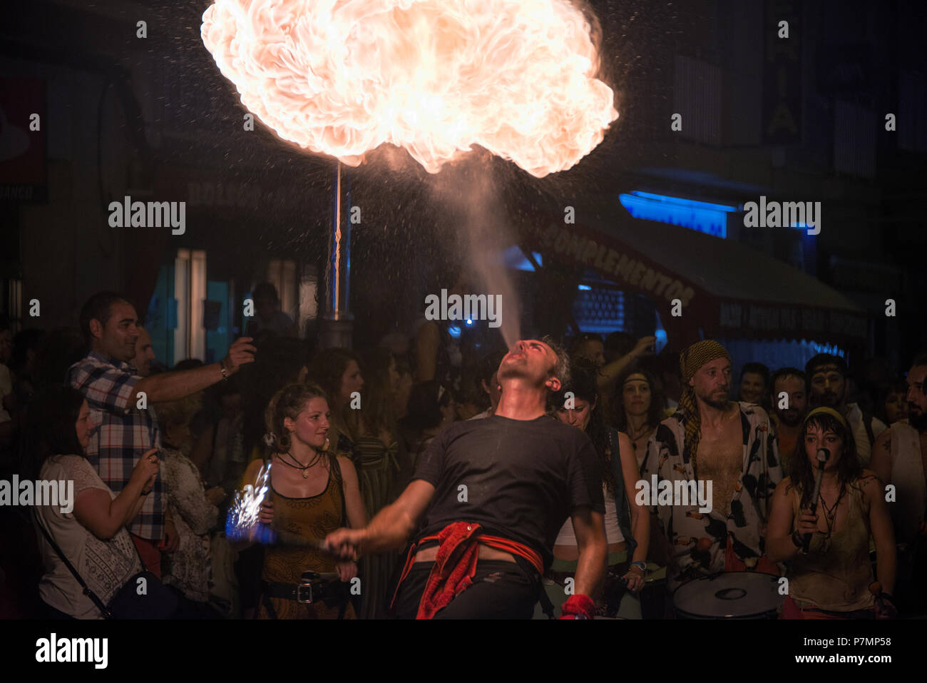 A street performance of fire by the circus school Babarots helps celebrate the festival of Saint John in Peniscola Spain on June 21st 2018 Stock Photo