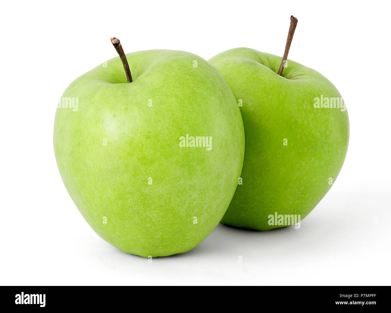Two green apples on a white background Stock Photo