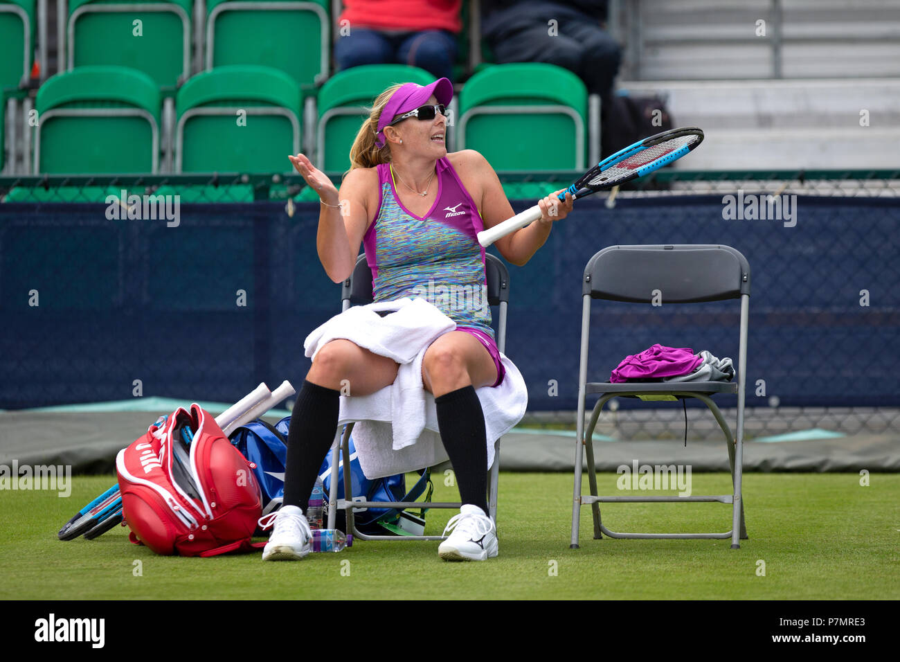 Professional tennis player Anastasia Rodionova arguing with the umpire from her chair during a match. Stock Photo