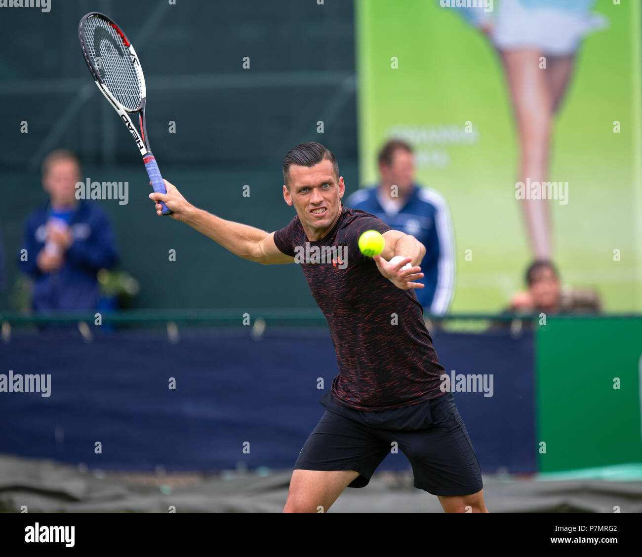 Tobias Kamke, professional male tennis player, prepares to play a