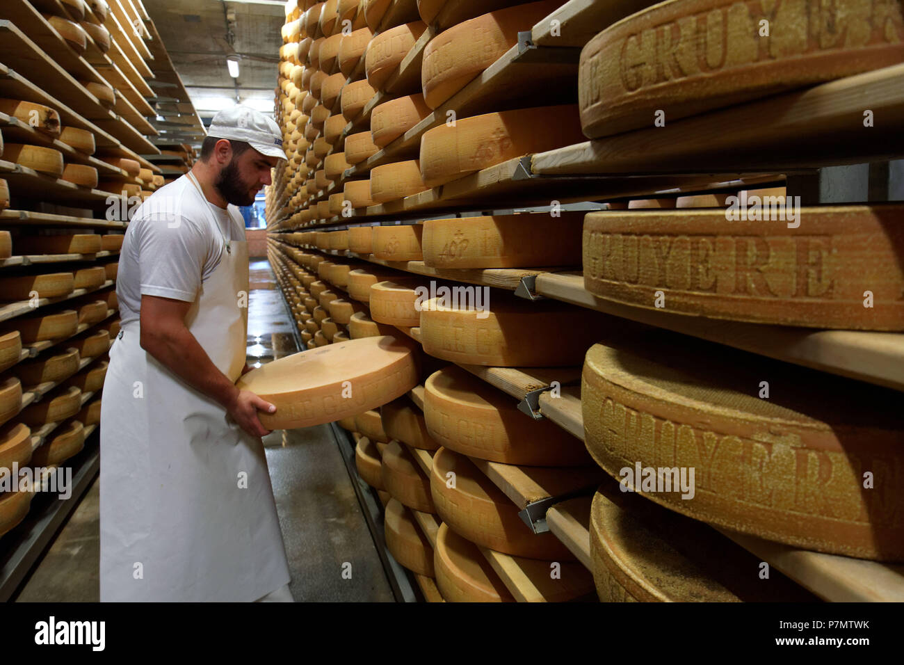 https://c8.alamy.com/comp/P7MTWK/switzerland-canton-of-fribourg-gruyeres-la-maison-du-gruyere-house-of-gruyere-cheese-gruyere-cheese-in-cellar-P7MTWK.jpg
