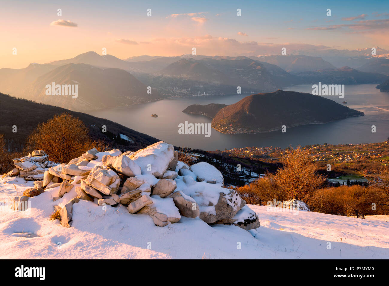 Winter in iseo lake at sunset, Lombardy district, Brescia province, Italy, Stock Photo