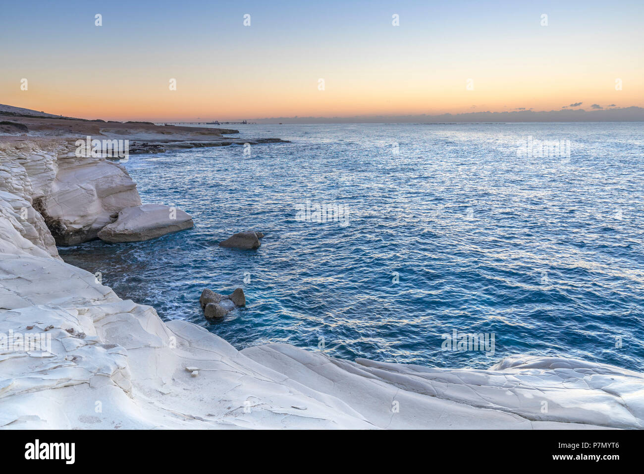 Cyprus, Limassol, The crystal water and the white rocks of Governor's Beach at dawn Stock Photo