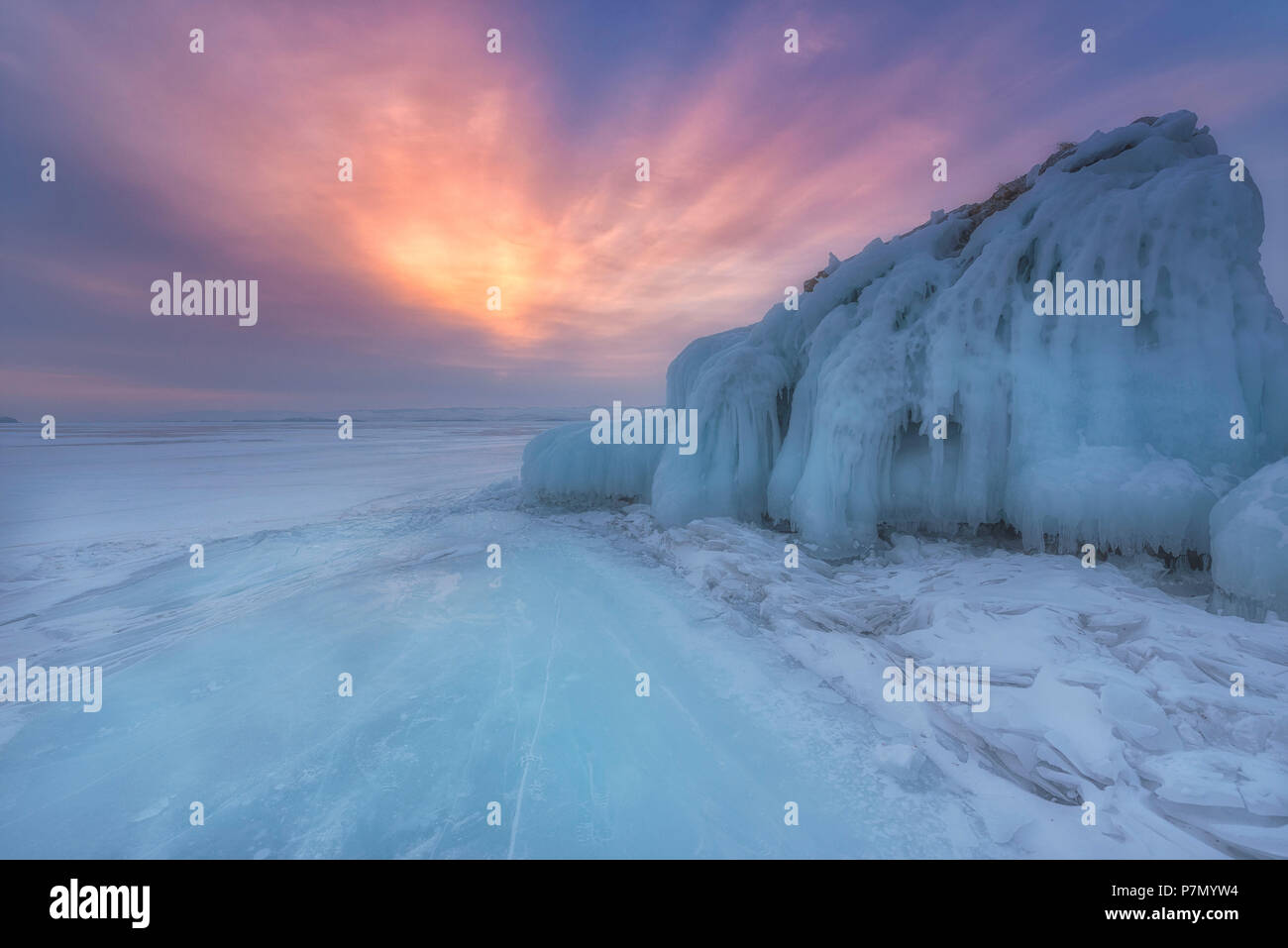 Ice mountain at sunrise at lake Baikal, Irkutsk region, Siberia, Russia Stock Photo