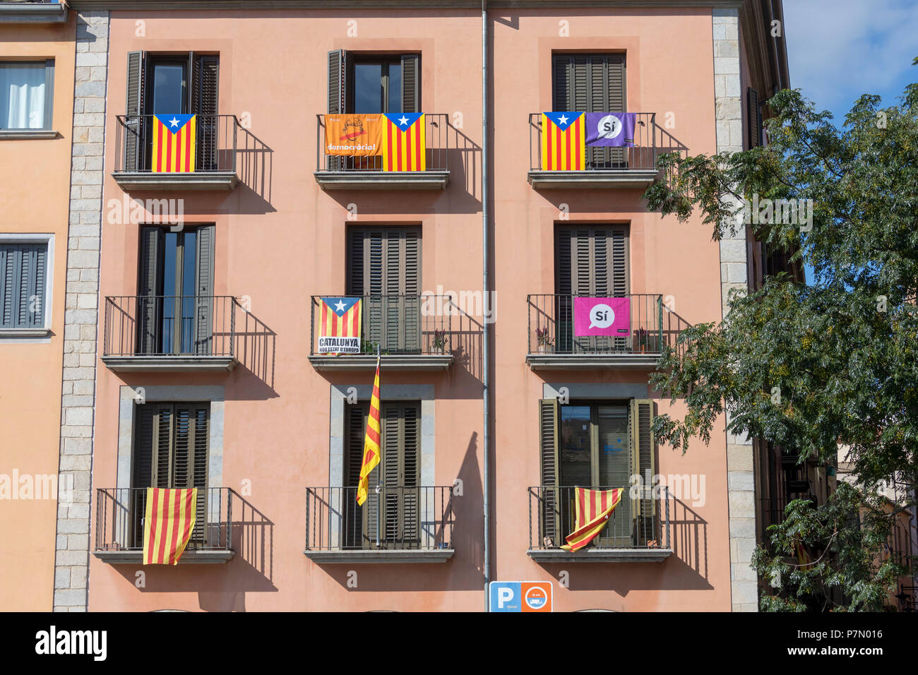 Catalan independence flags hanging from balconies, Girona, Catalonia, Spain Stock Photo