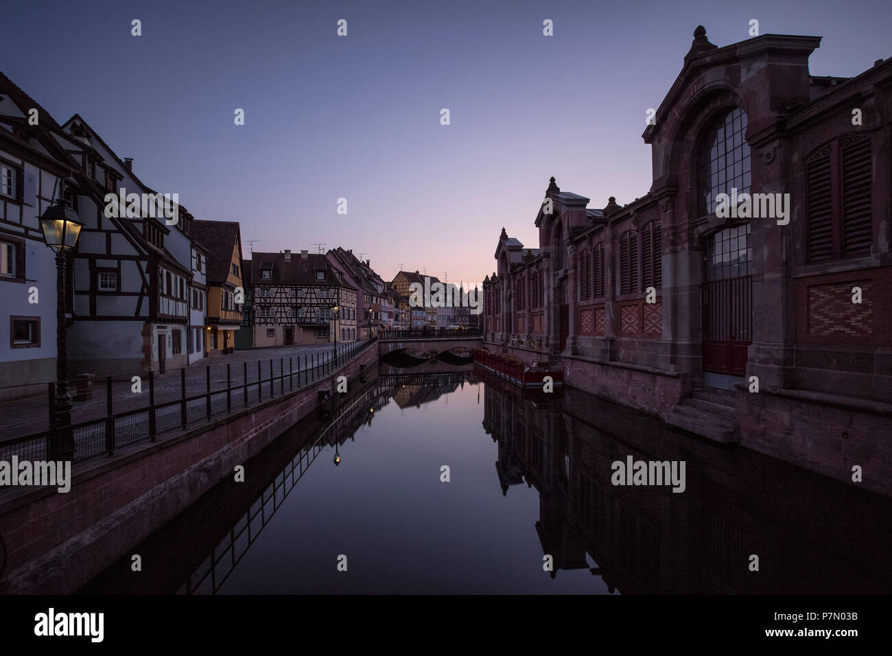 Buildings along a water canal in Colmar, Alsace, Haut-Rhin France Stock Photo