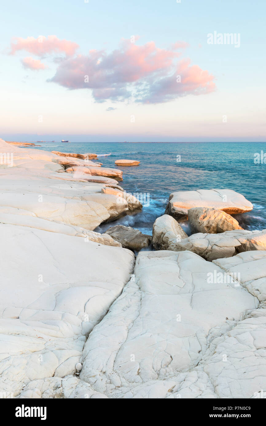 Cyprus, Limassol, The crystal water and the white rocks of Governor's Beach at sunrise Stock Photo