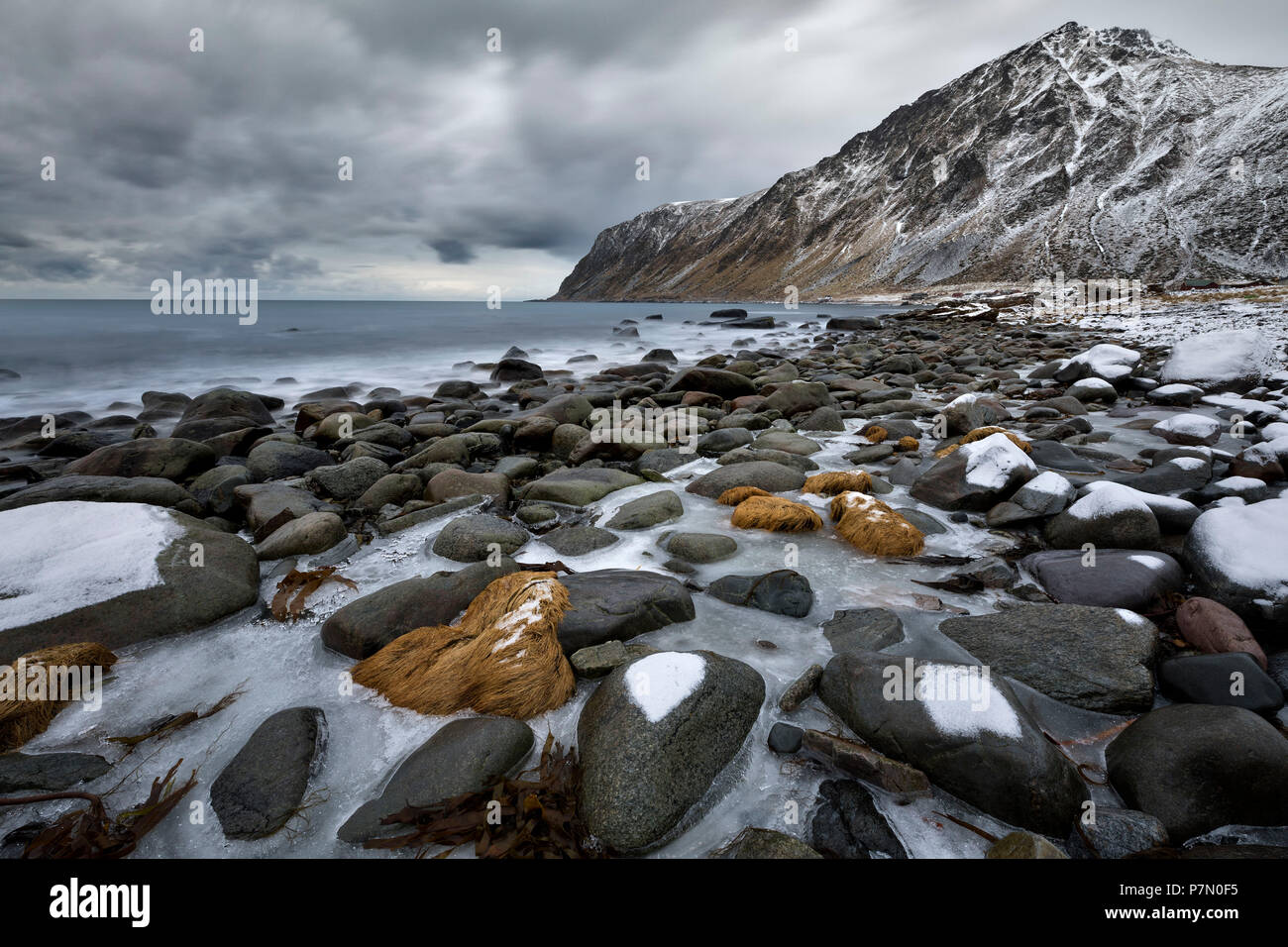 sea scape in Vareid whit Hustinden mountain, municipality of Flakstad, Lofoten Island, Norway, Europe Stock Photo
