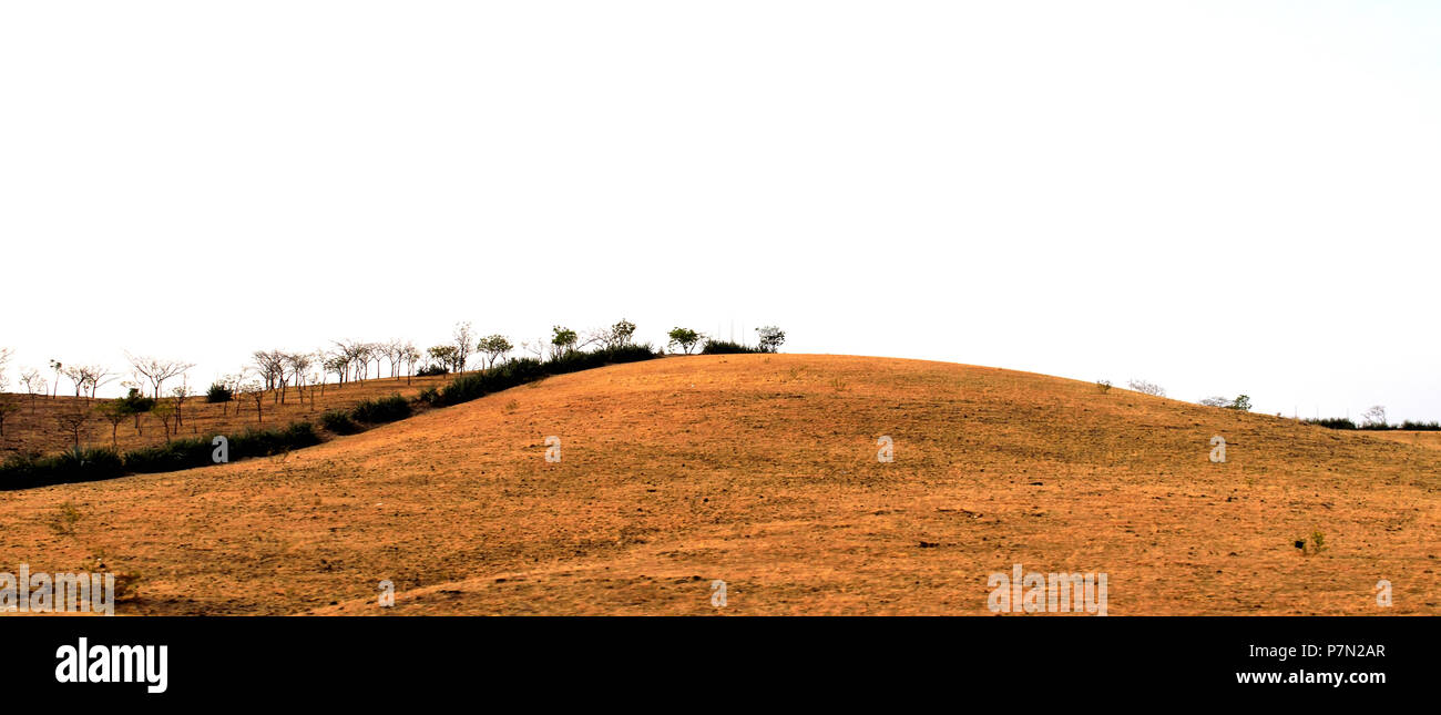 Barren piece of land in desert and semi arid area  similar to landscape that of windows xp green wallpaper Stock Photo