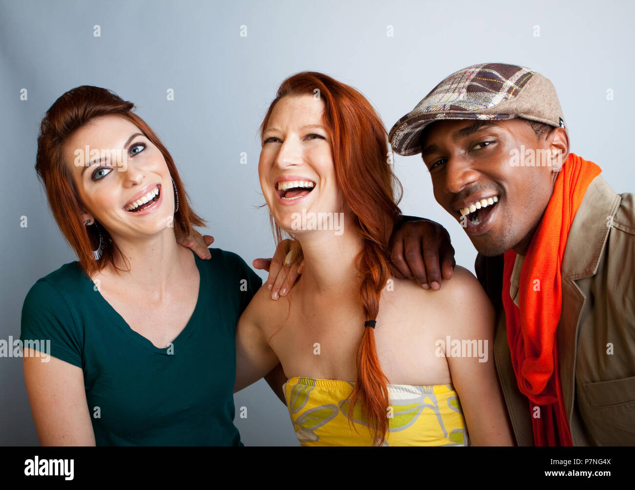 Young friends laughing and hanging out. Stock Photo