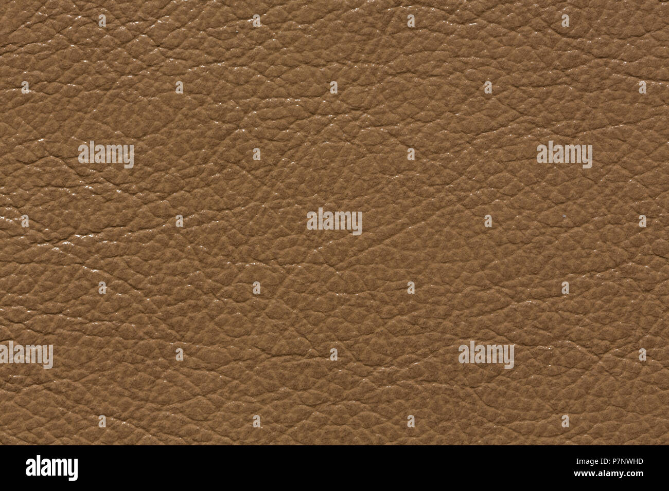 Stylish leather background in delicate brown tone. Stock Photo