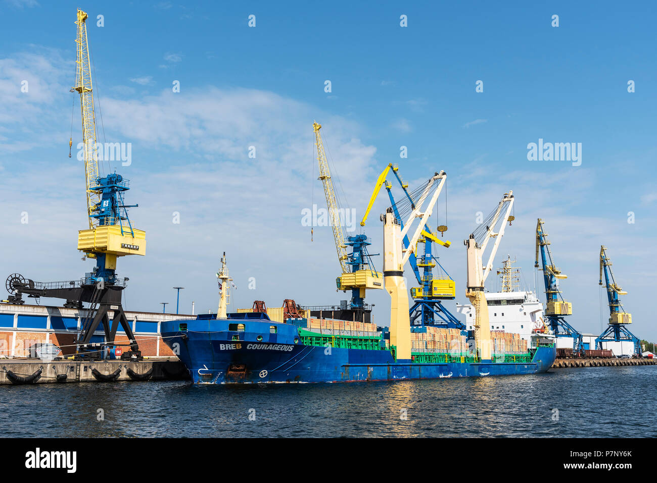 Cargo ship and cranes at the overseas port, Wismar, MecklenburgWestern