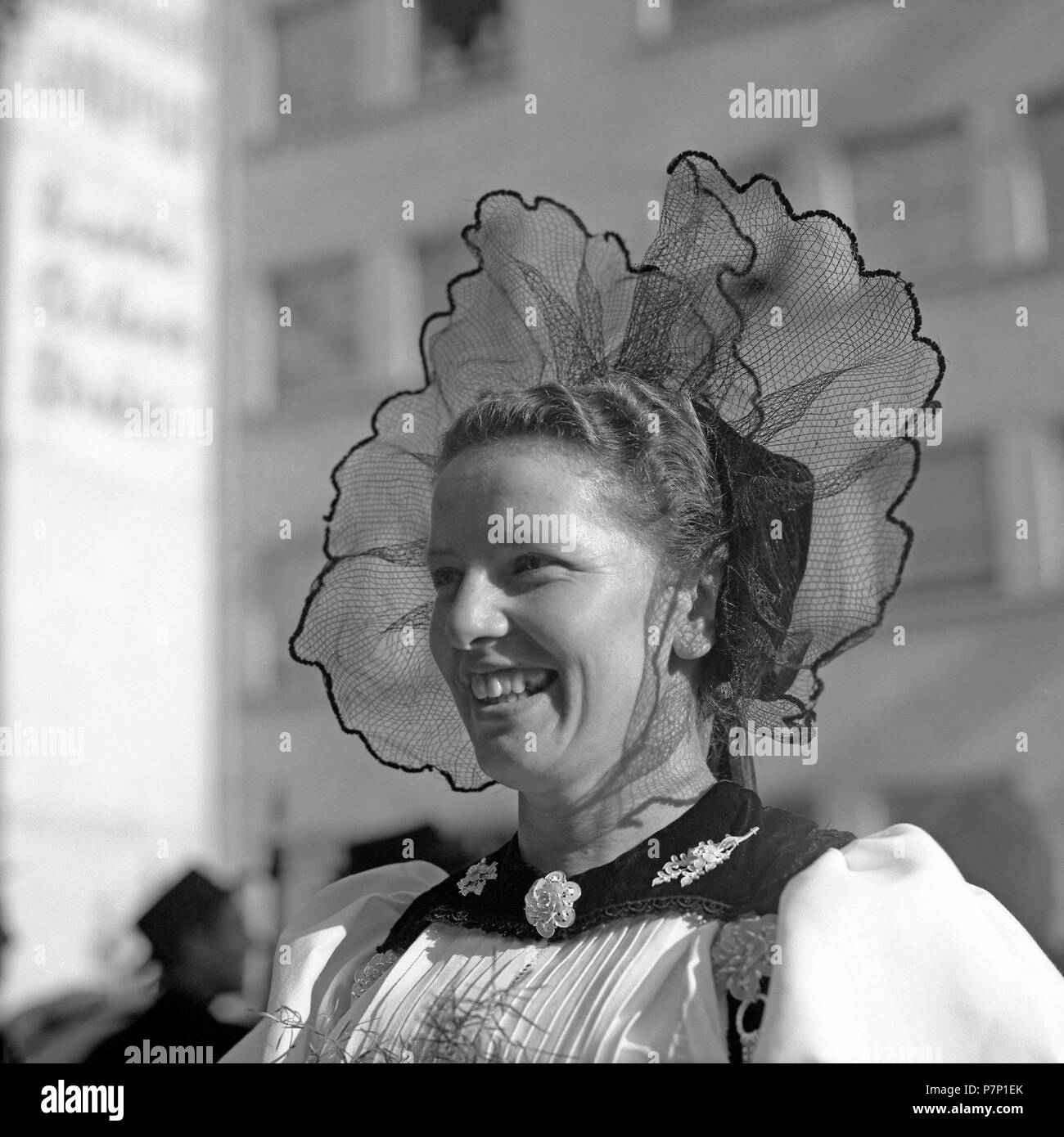 Woman In Traditional Traditional Costume With Hair Ornaments