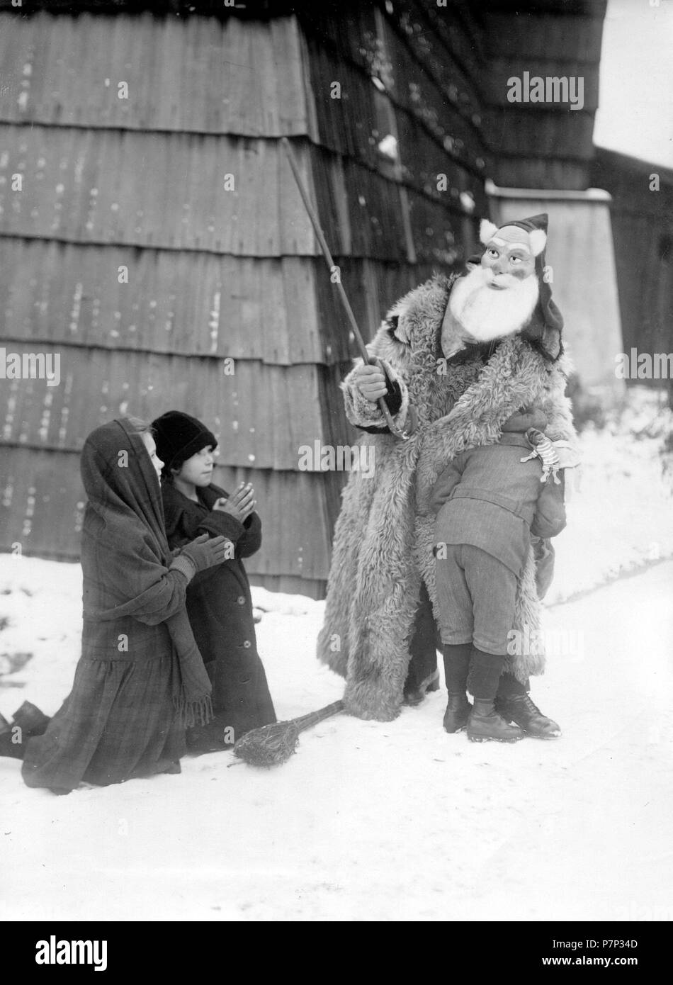 Nikolaus punishes children ca. 1930, exact place unknown, Germany Stock Photo