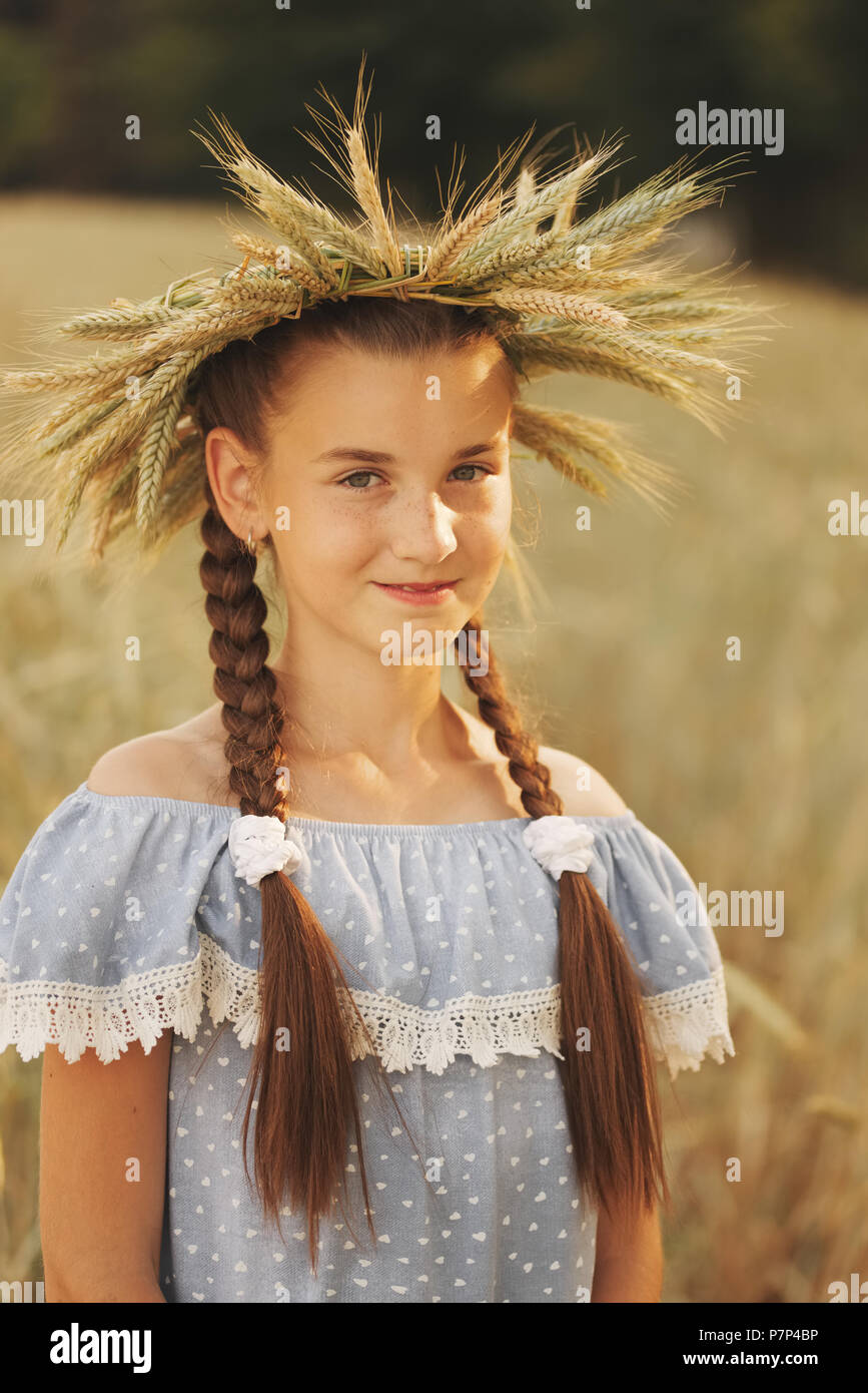 young girl in the yellow field Stock Photo - Alamy