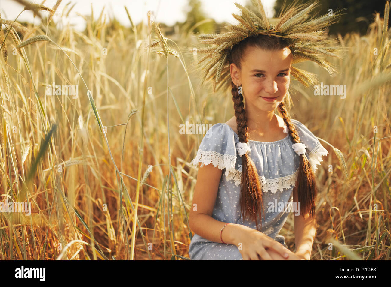young girl in the yellow field Stock Photo - Alamy