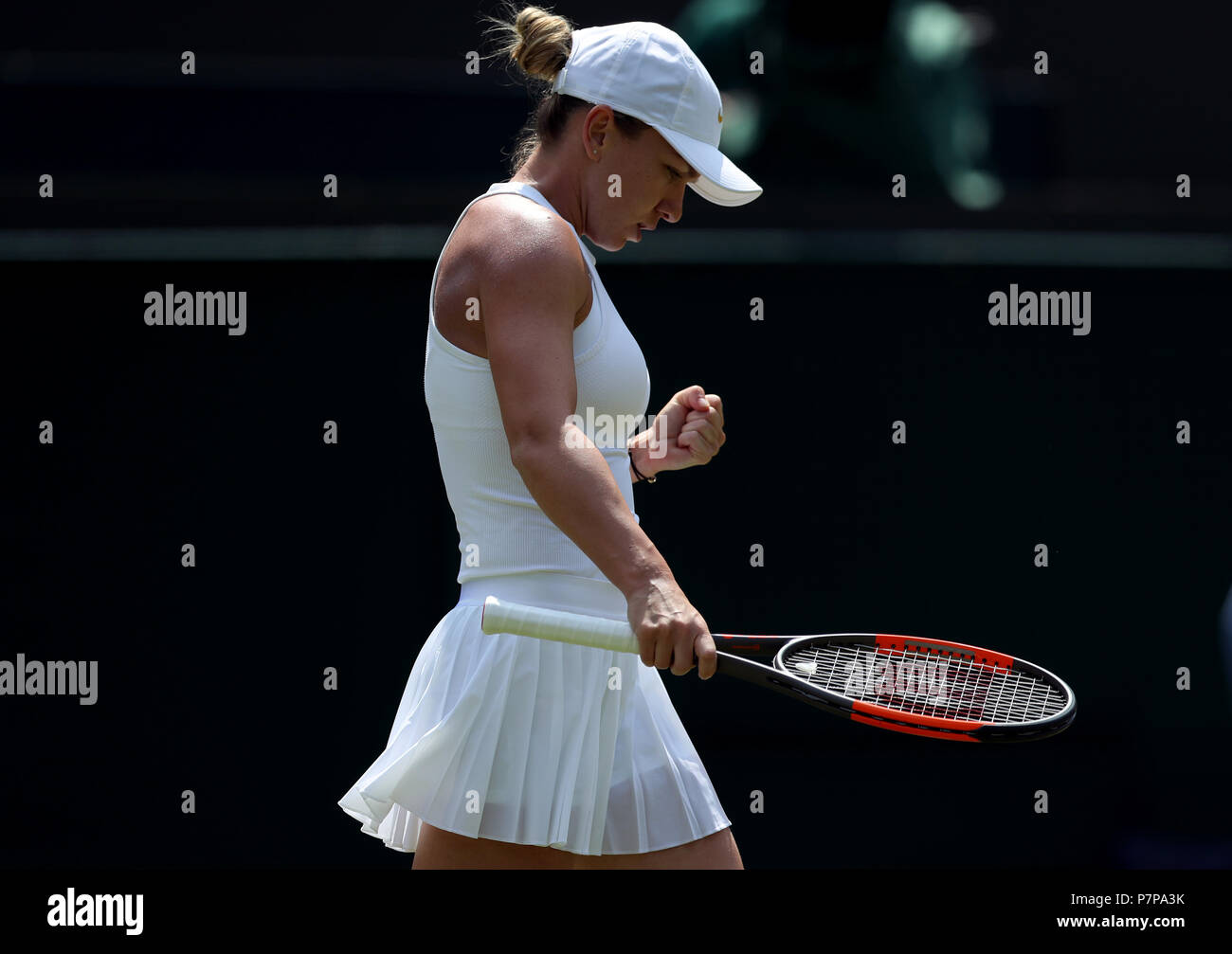 Simona Halep in action on day six of the Wimbledon Championships at the All England Lawn Tennis and Croquet Club, Wimbledon. PRESS ASSOCIATION Photo. Picture date: Saturday July 7, 2018. See PA story TENNIS Wimbledon. Photo credit should read: Jonathan Brady/PA Wire. Stock Photo