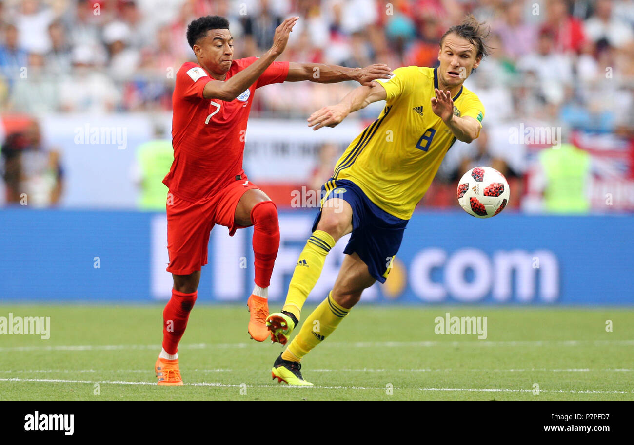 England's Jesse Lingard (left) and Sweden's Albin Ekdal battle for the ball during the FIFA World Cup, Quarter Final match at the Samara Stadium. Stock Photo