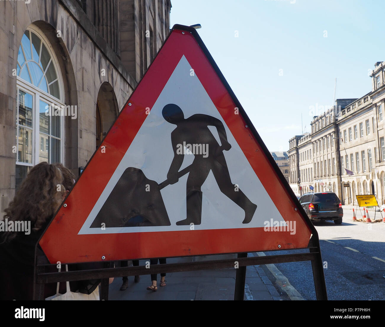 Warning signs, road works in progress traffic sign Stock Photo Alamy