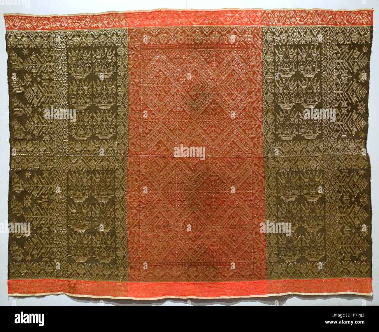 English: Exhibit in the Textile Museum, George Washington University, Washington, DC, USA. Photography was permitted in the museum without restriction. This work is old enough so that it is in the . 26 March 2015, 15:55:19 235 Kre alang (skirt), Indonesia, Sumbawa, Semawa people, early 20th century, cotton, metal-wrapped silk - Textile Museum, George Washington University - DSC09773 Stock Photo