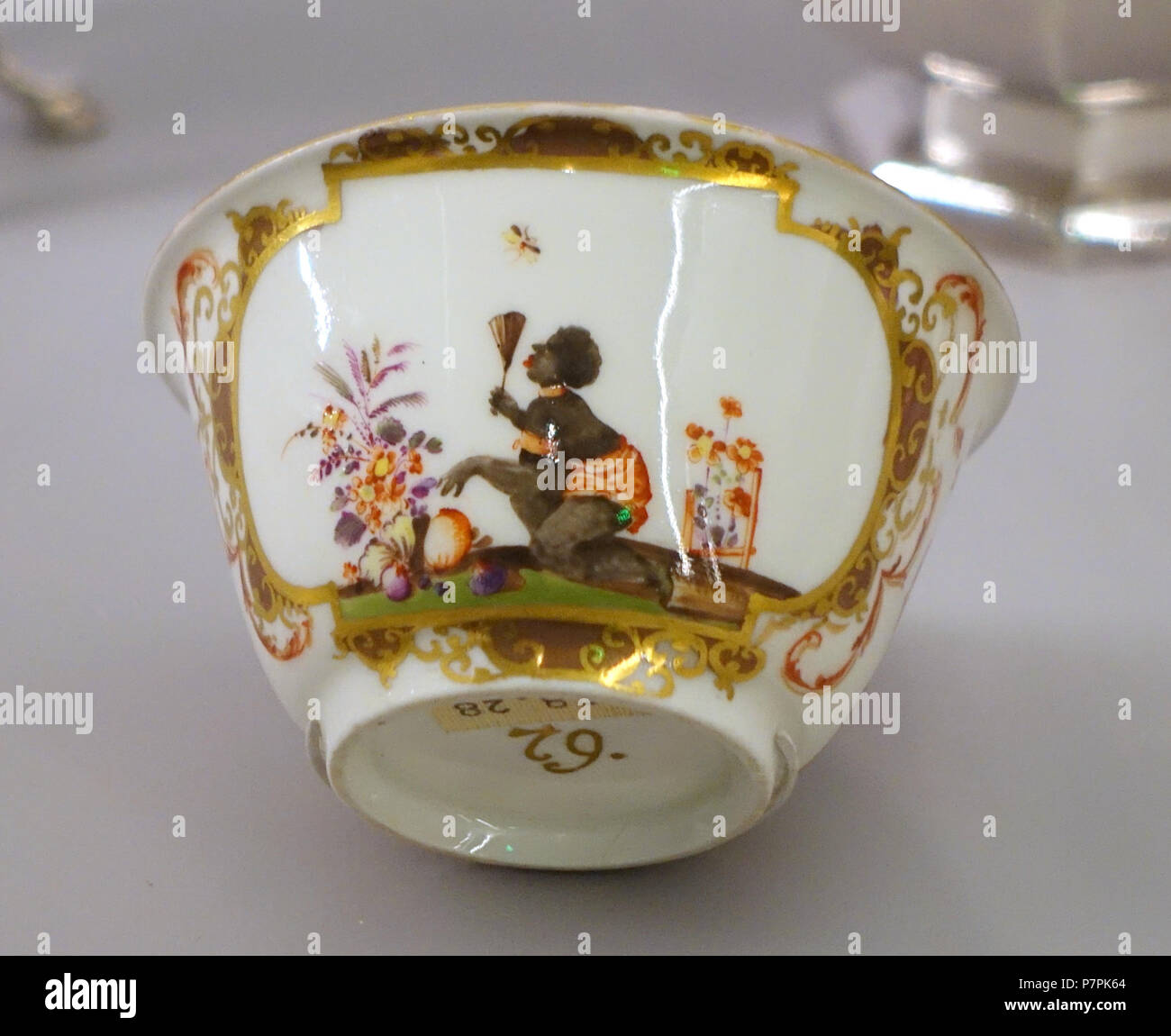 English: Exhibit in the Busch-Reisinger Museum, Harvard University, Cambridge, Massachusetts, USA. This artwork is in the  because the artist died more than 70 years ago. 11 April 2015, 12:16:08 100 Cup, Meissen Porcelain Manufactory, early 1700s, hard-paste porcelain, polychrome enamel, gilding - Busch-Reisinger Museum, Harvard University - DSC01336 Stock Photo