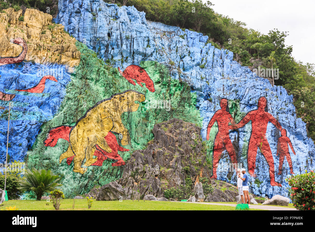 Tourist attraction, giant stone wall painting made to look like a prehistoric work, in Parque Nacional Viñales, Sierra de Viñales, Cuba Stock Photo