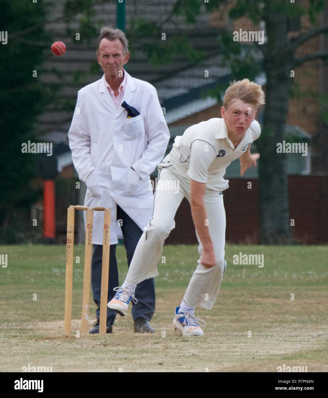 A fast bowler in action. Stock Photo