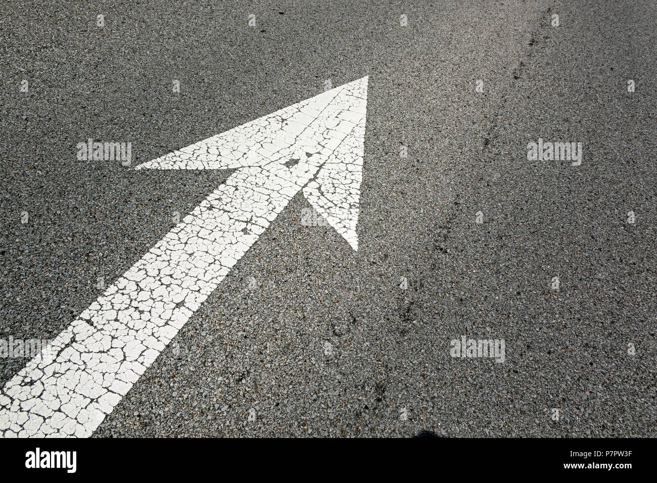 an image of an arrow sign on the road Stock Photo