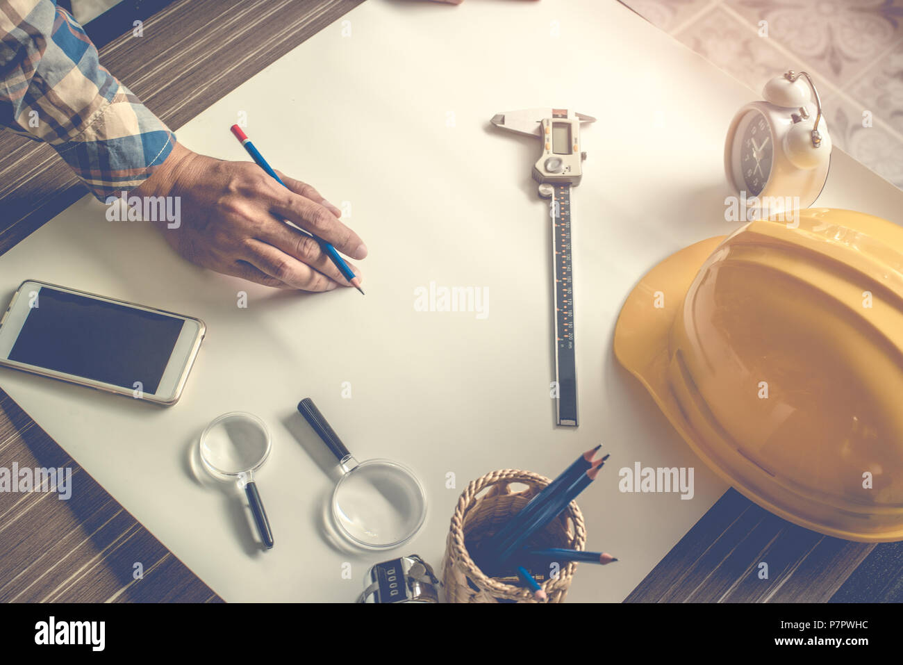 Engineer doing blank draft the drawing on white paper. Engineer and Structure concept. Construction theme Stock Photo