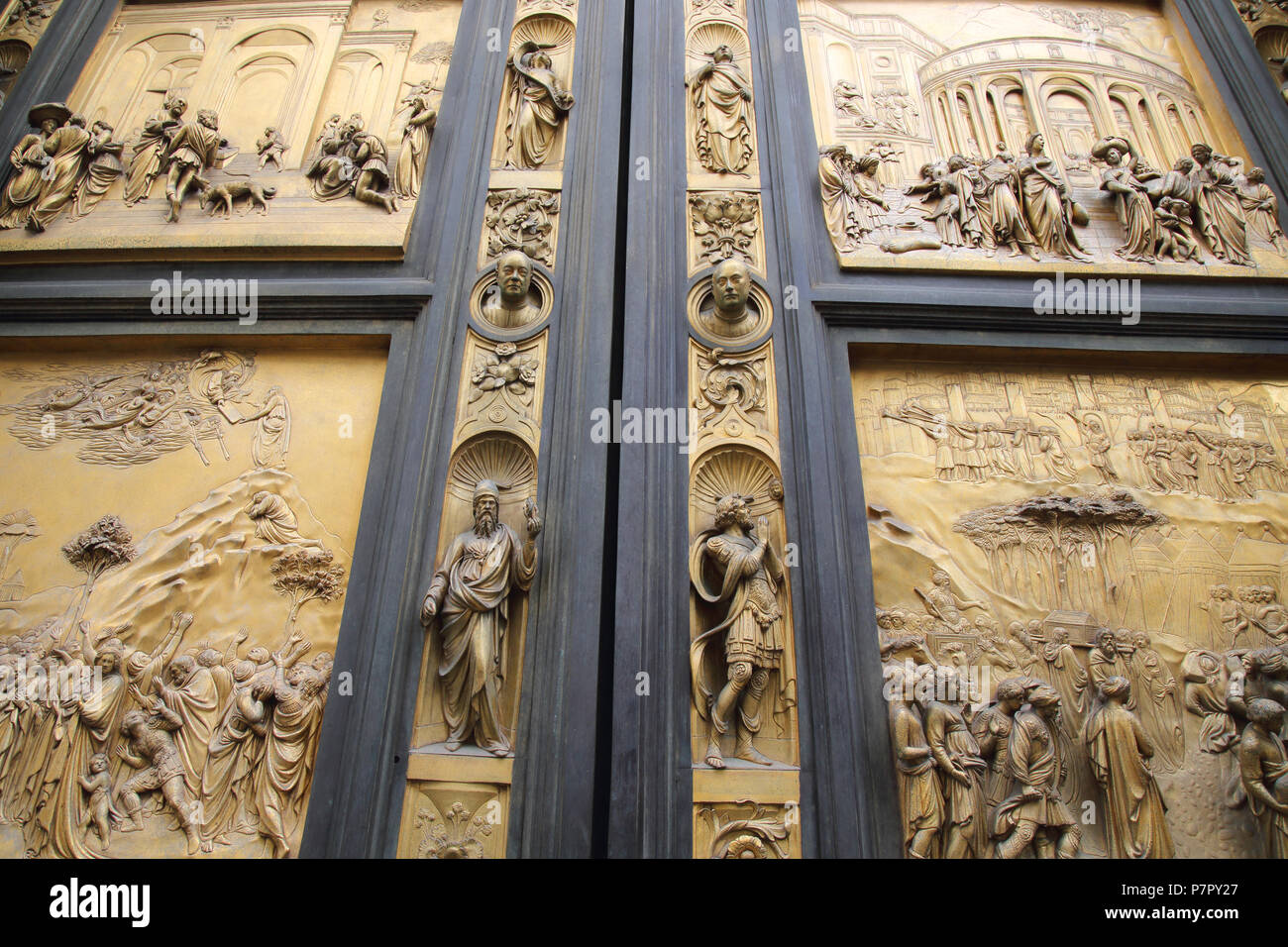 the bronze east doors of the baptistery at the duomo in florence Stock Photo Alamy