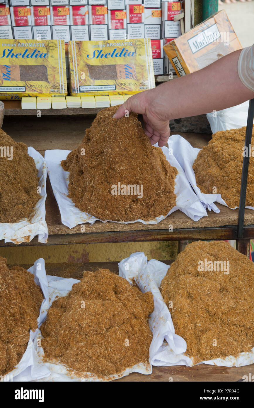 fresh cut tobacco heap at market in Skhodra, Albania Stock Photo