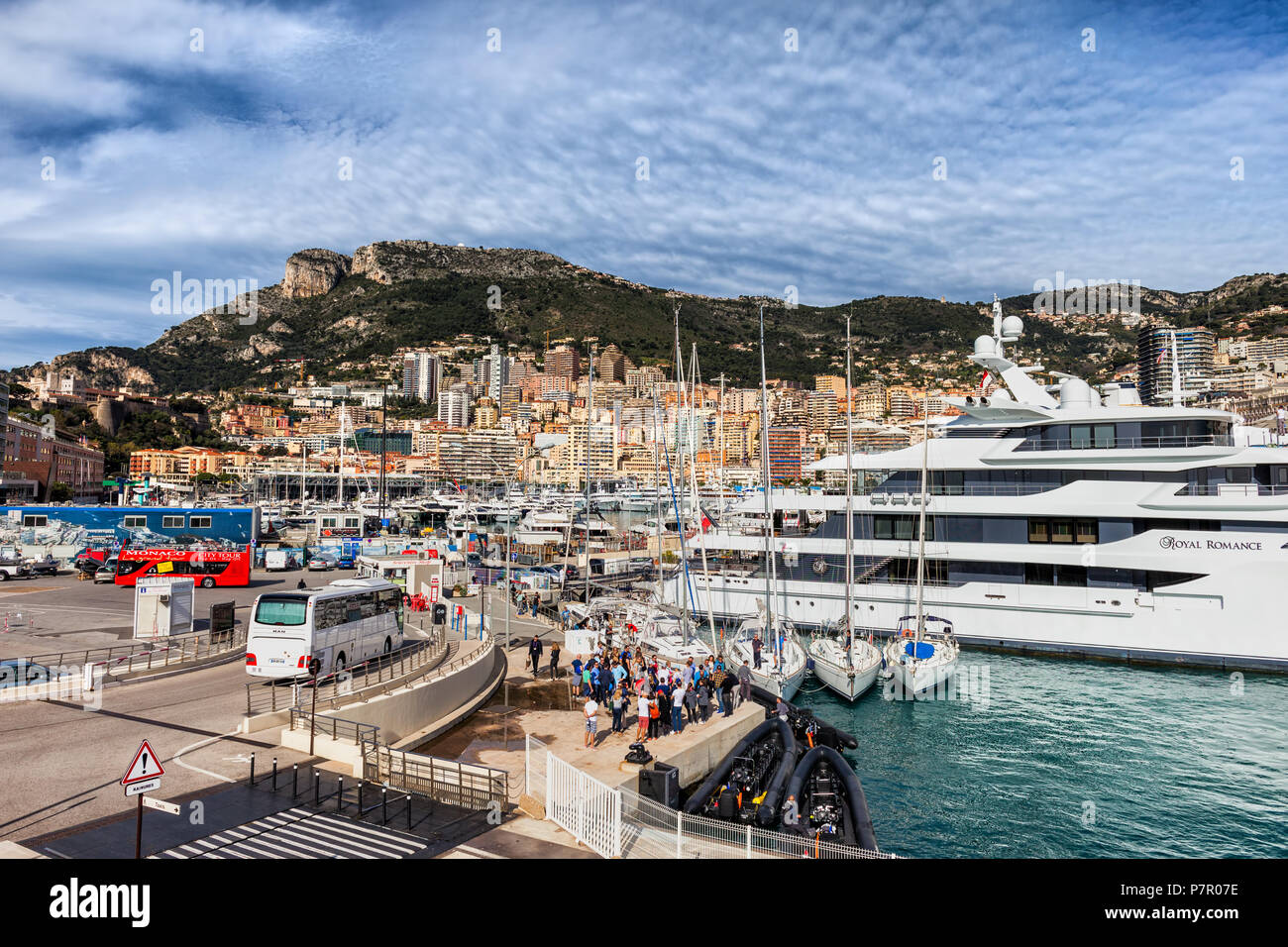 Principality of Monaco quay, yacht and sailing boats at Port Hercule on Mediterranean Sea, Europe Stock Photo