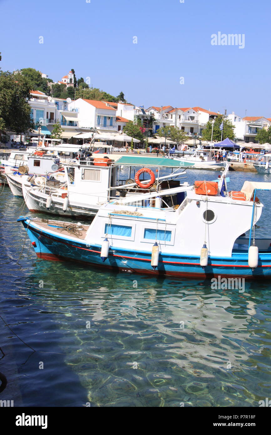 Local fishing boats moored in the old harbour at Skiathos Town, Skiathos Island, GREECE, PETER GRANT Stock Photo