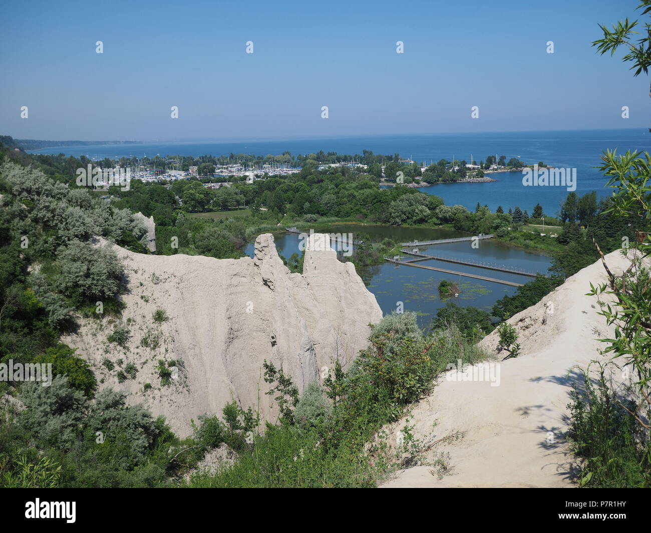 Toronto, view from edge of the cliff at Scarborough Bluffs to park and lake Ontario below Stock Photo