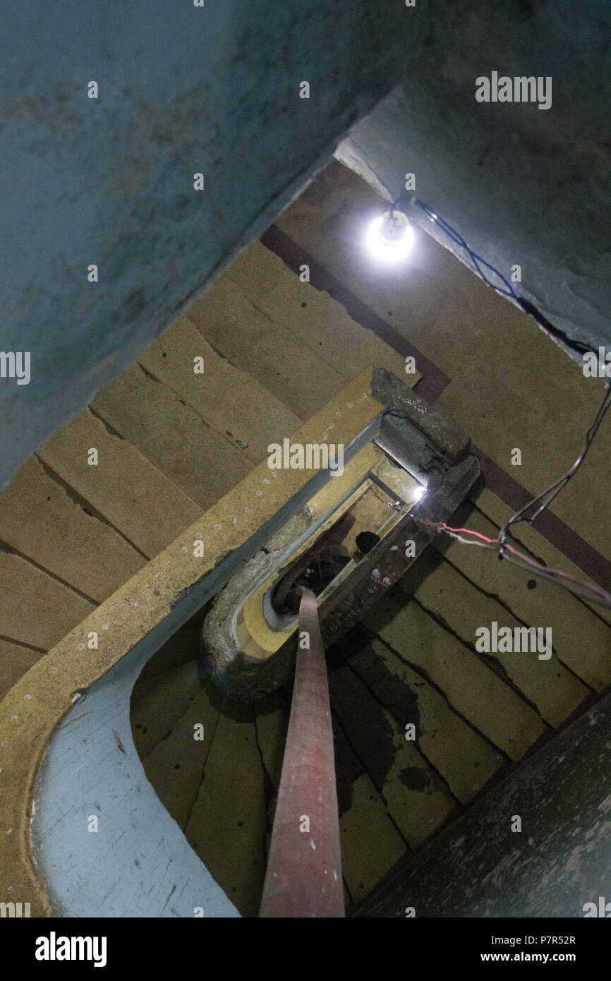 Dangerous spiral stairs in a worn building Stock Photo Alamy