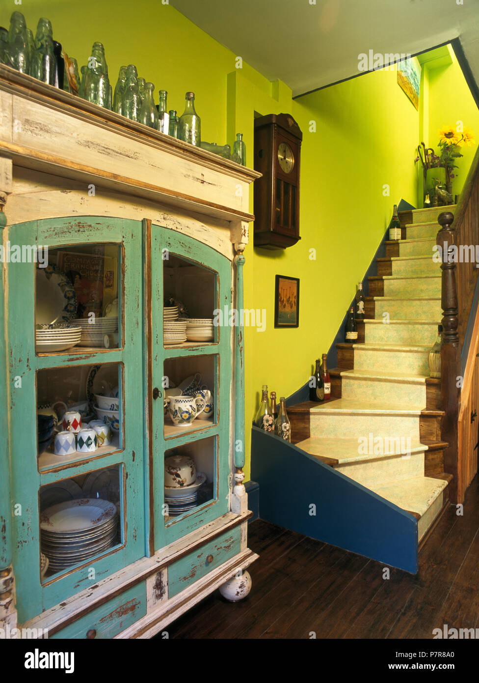 Painted Dresser Beside Wooden Staircase In Lime Green Nineties