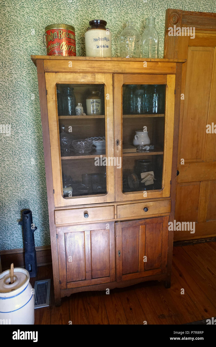 English: Exhibit in the O. Henry Museum - Austin, Texas, USA. This work is old enough so that it is in the . 19 November 2015, 14:54:49 230 Kitchen cabinet - O. Henry Museum - Austin, Texas - DSC09249 Stock Photo