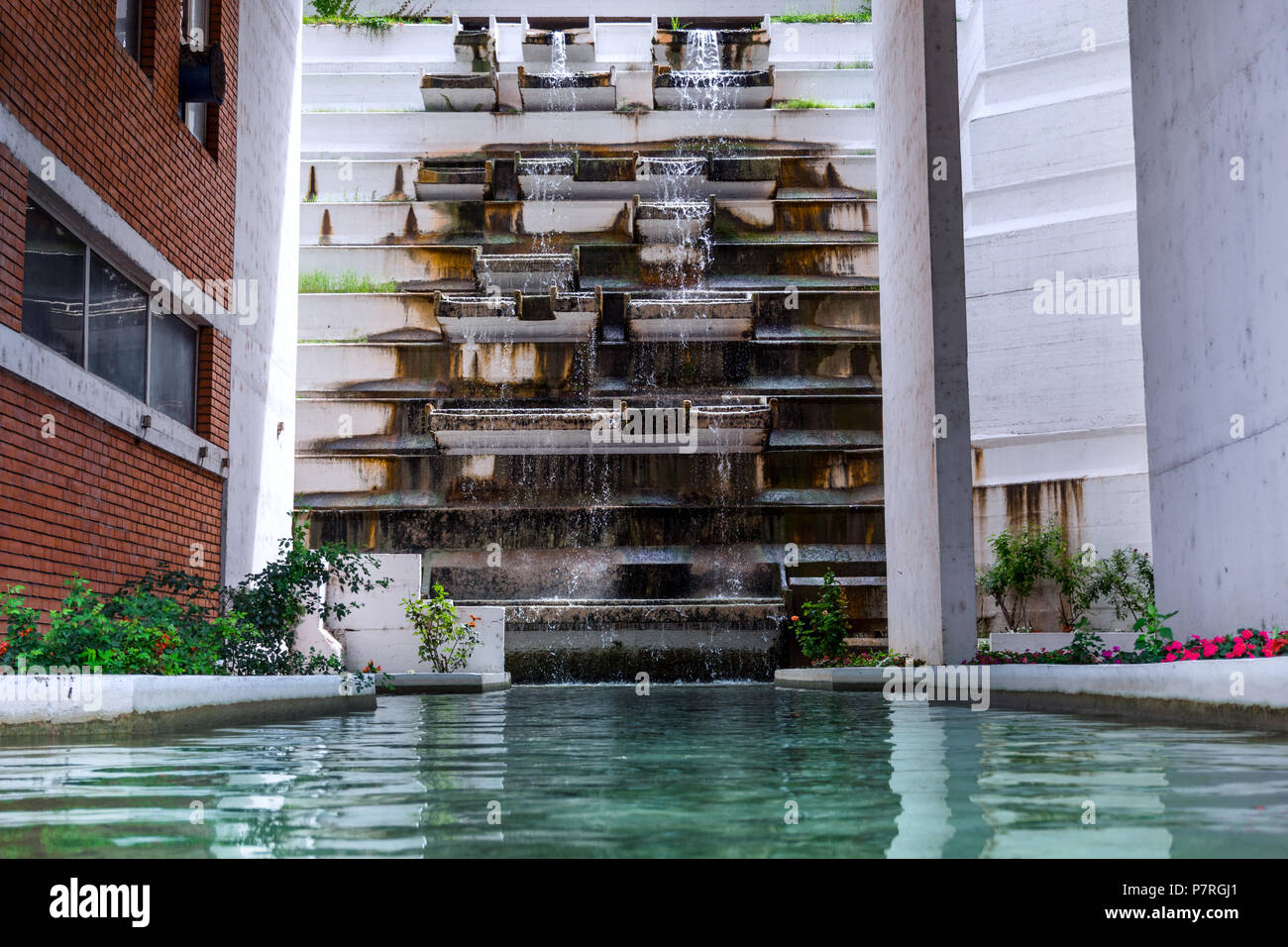 Spa healthy water and artificial waterfall building in resort. Source of healthy and healing water Stock Photo