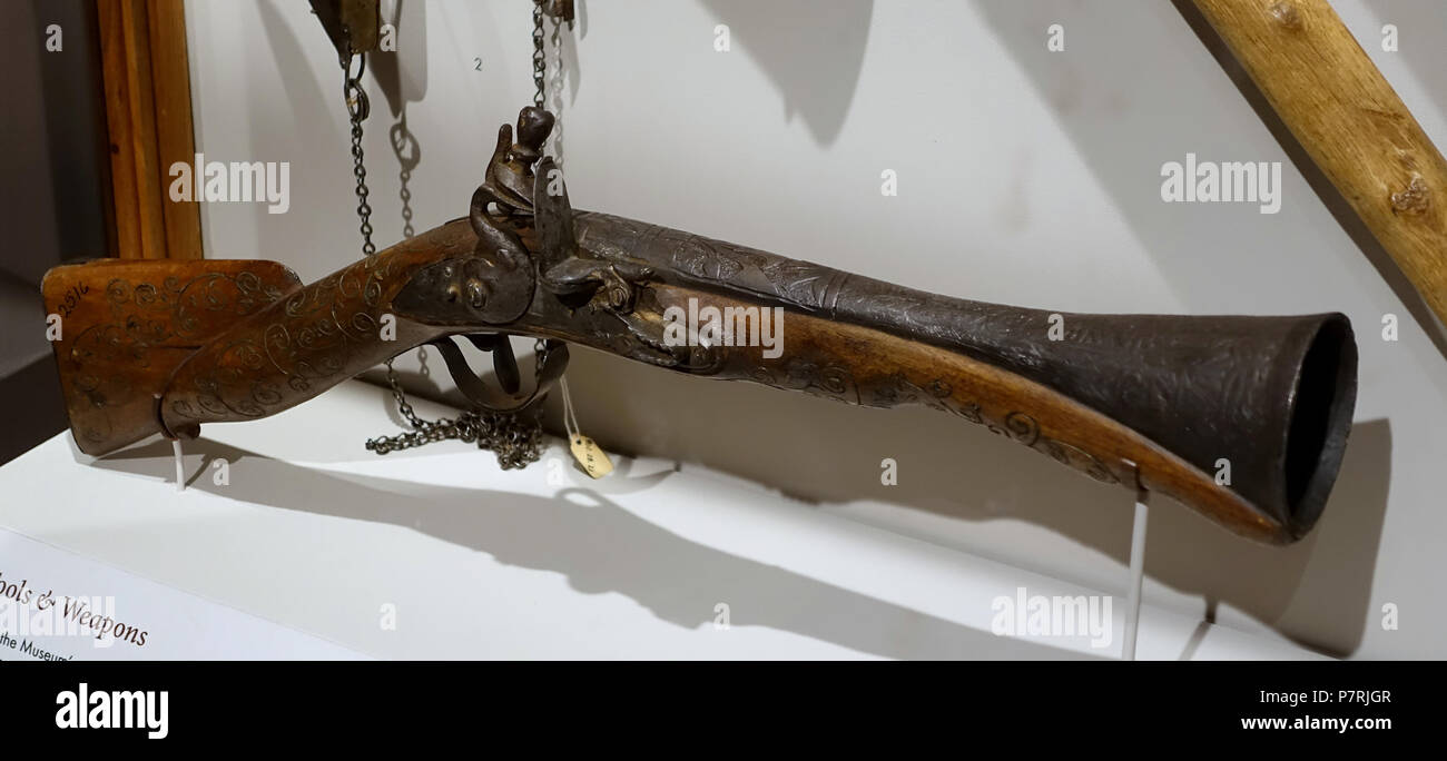 English: Exhibit in the Harvard Semitic Museum, Harvard University - Cambridge, Massachusetts, USA. This work is old enough so that it is in the . 3 April 2016, 14:20:18 47 Blunderbuss, purchased at the Inn of the Good Samaritan, near Jericho, 1902, wood and steel - Harvard Semitic Museum - Cambridge, MA - DSC06225 Stock Photo