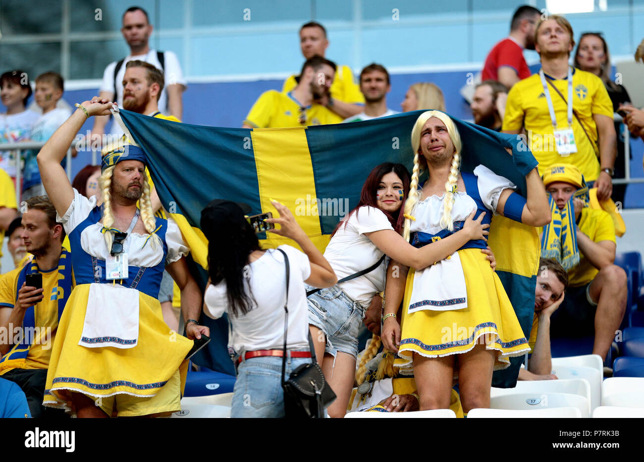 Sweden supporters in fancy dress appear dejected at the end of the FIFA  World Cup, Quarter Final match at the Samara Stadium Stock Photo - Alamy